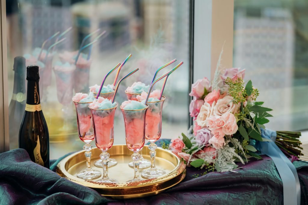 cotton candy champagne cocktails on windowsill.