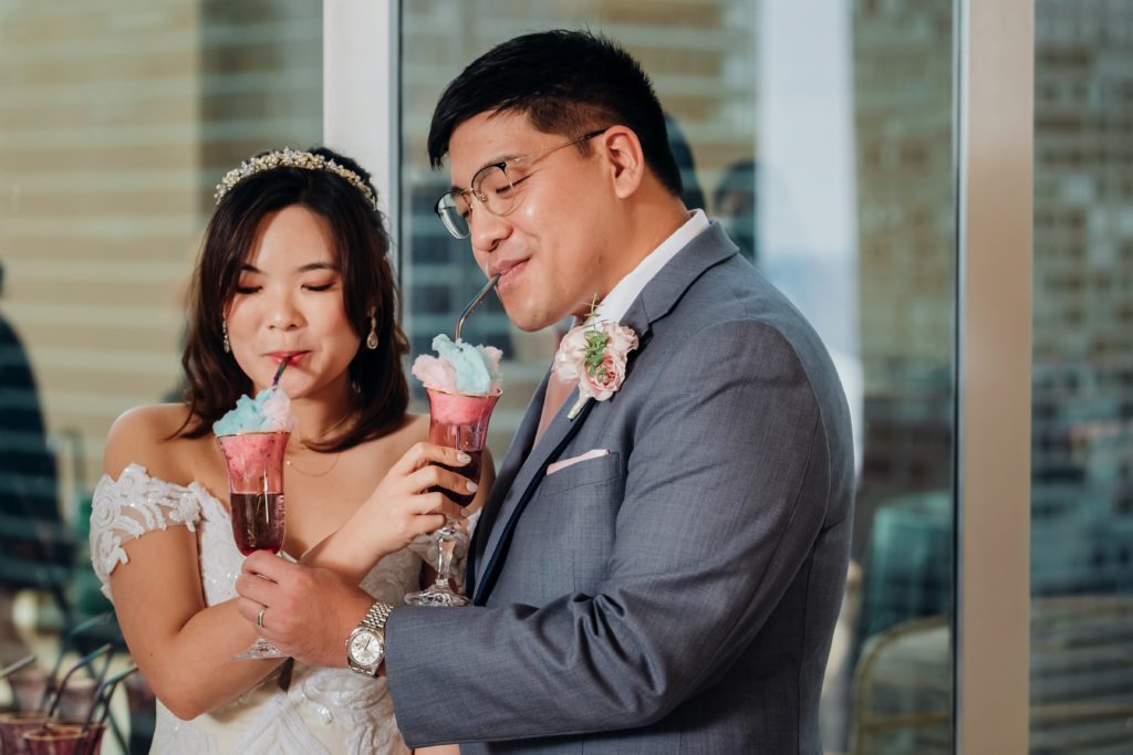 chinese bride and groom sipping cotton candy champagne cocktails