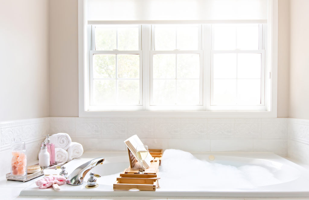 A photo of a bubble bath for self care.