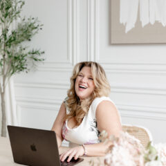 Danielle Andrews of Wedding Planners Institute of Canada being sassy on computer