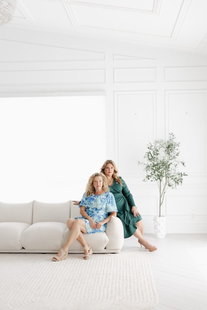 Tracey and Danielle, co-founders of WPIC on couch