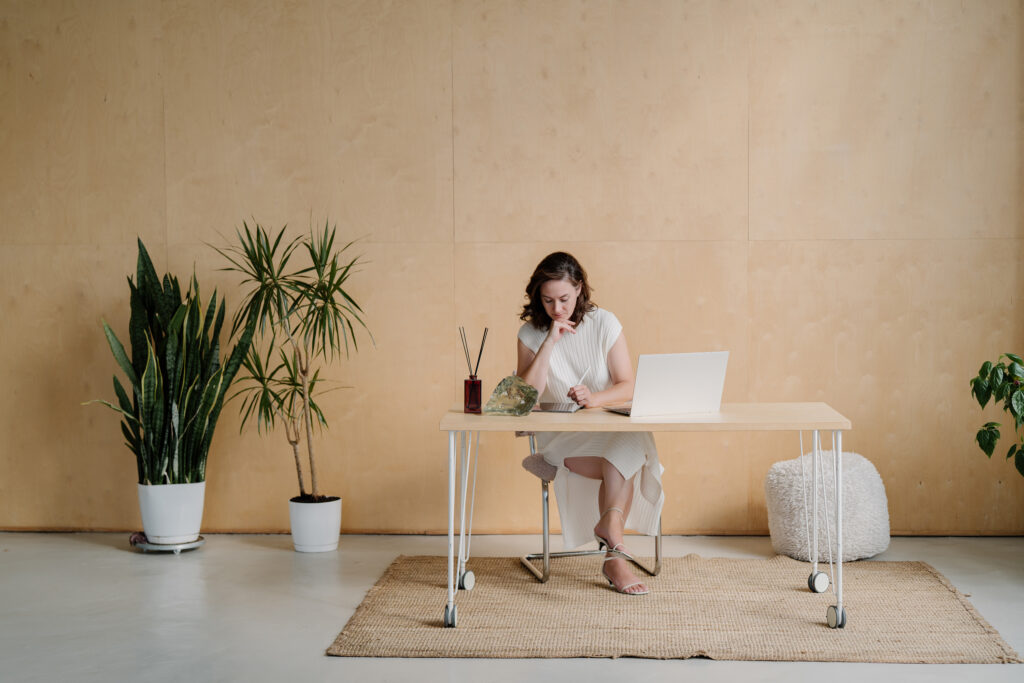 successful wedding planner working in her office