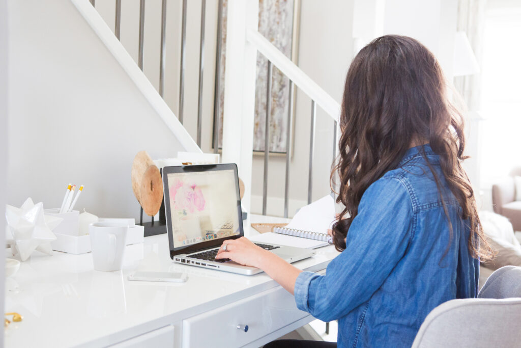 wedding planner working on her laptop