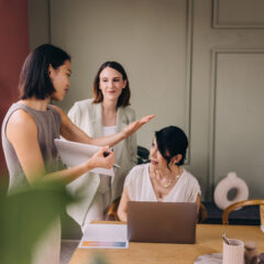 business women talking in office