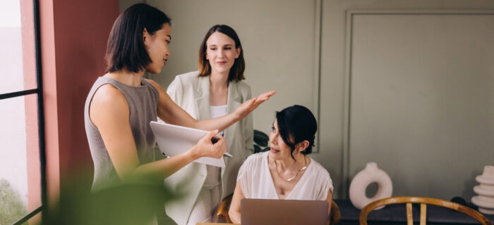 business women talking in office